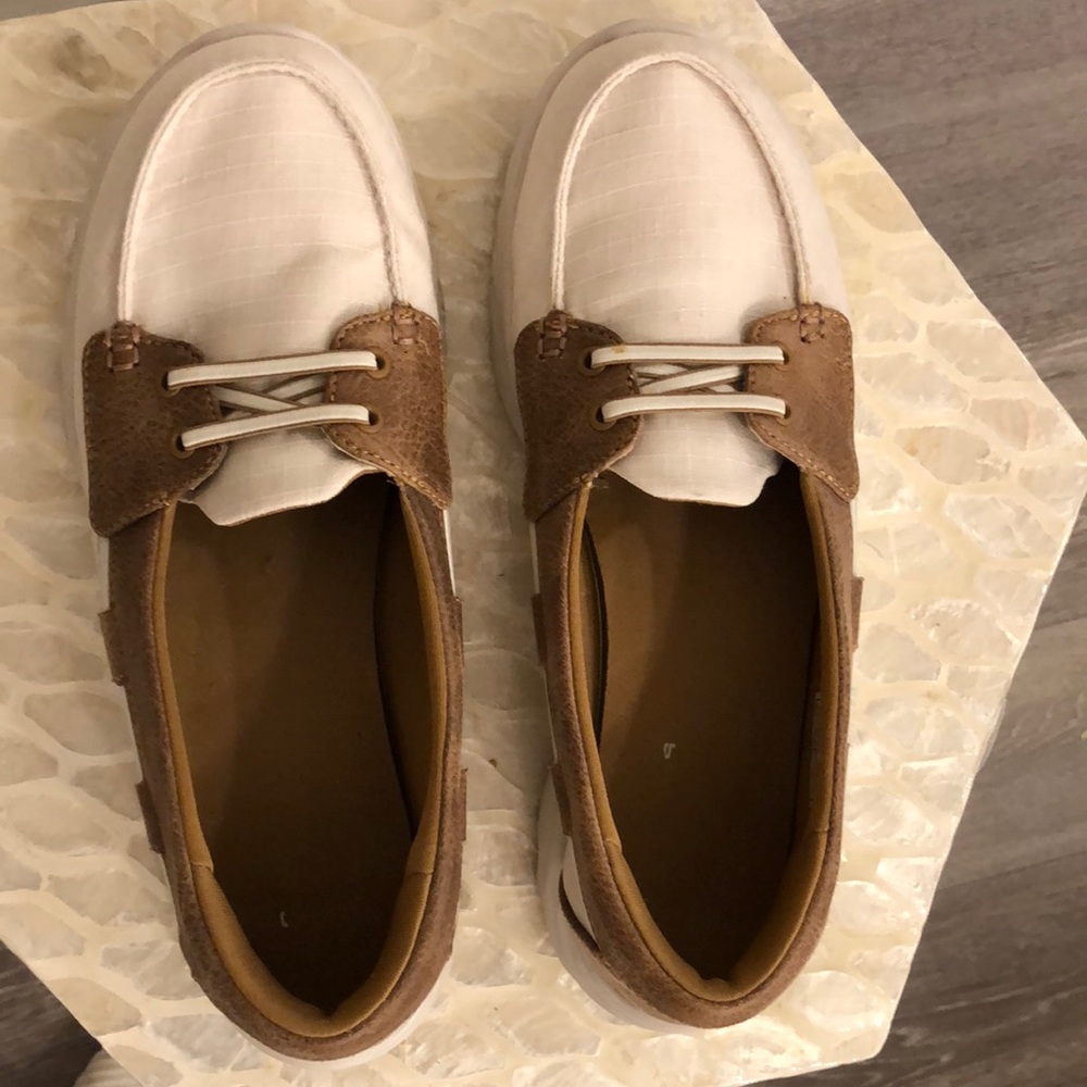 Women’s brown and tan Casual Shoes by Skechers